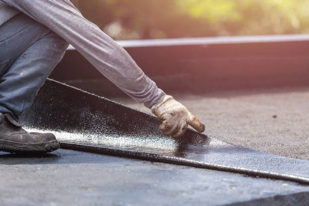 Professional Basement Waterproofing technician working in Bradford, PA